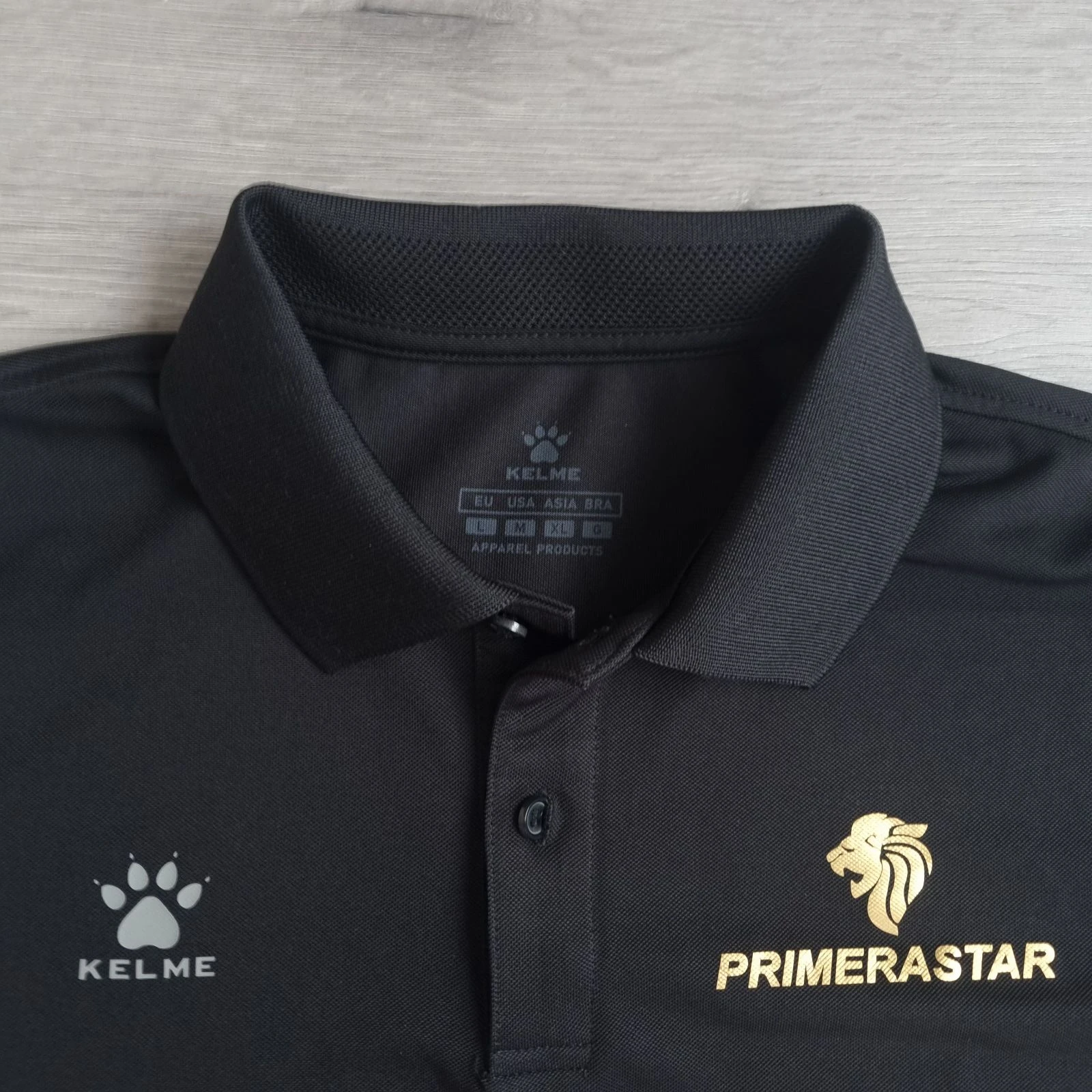 Polo deportivo negro KELME – Logo Primerastar Gold – Talla L / XL – photo 6